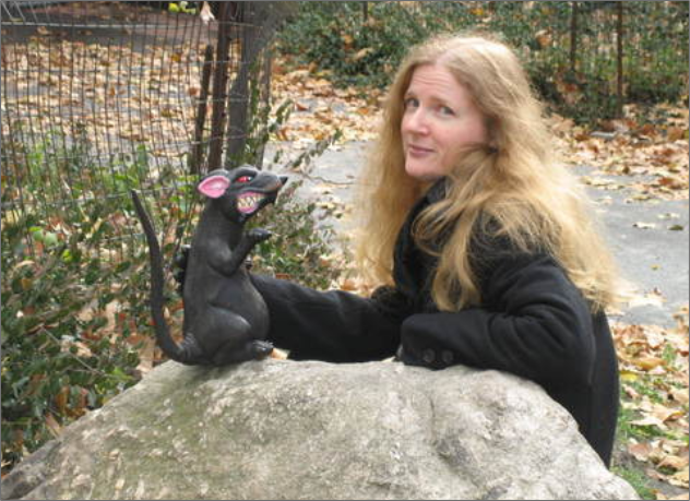 Suzanne Collins with a fake rat